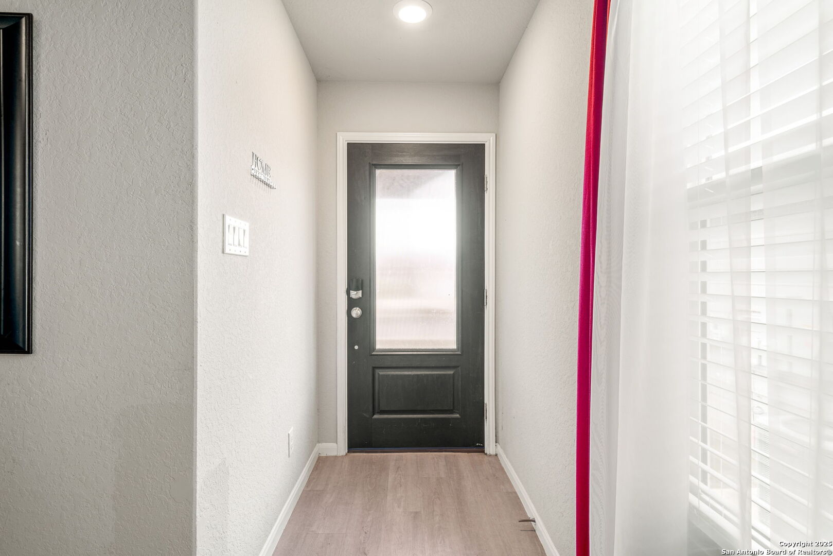 31646 Untrodden Way Bulverde, TX 78163 - Photo 5 of 36 a view of a hallway