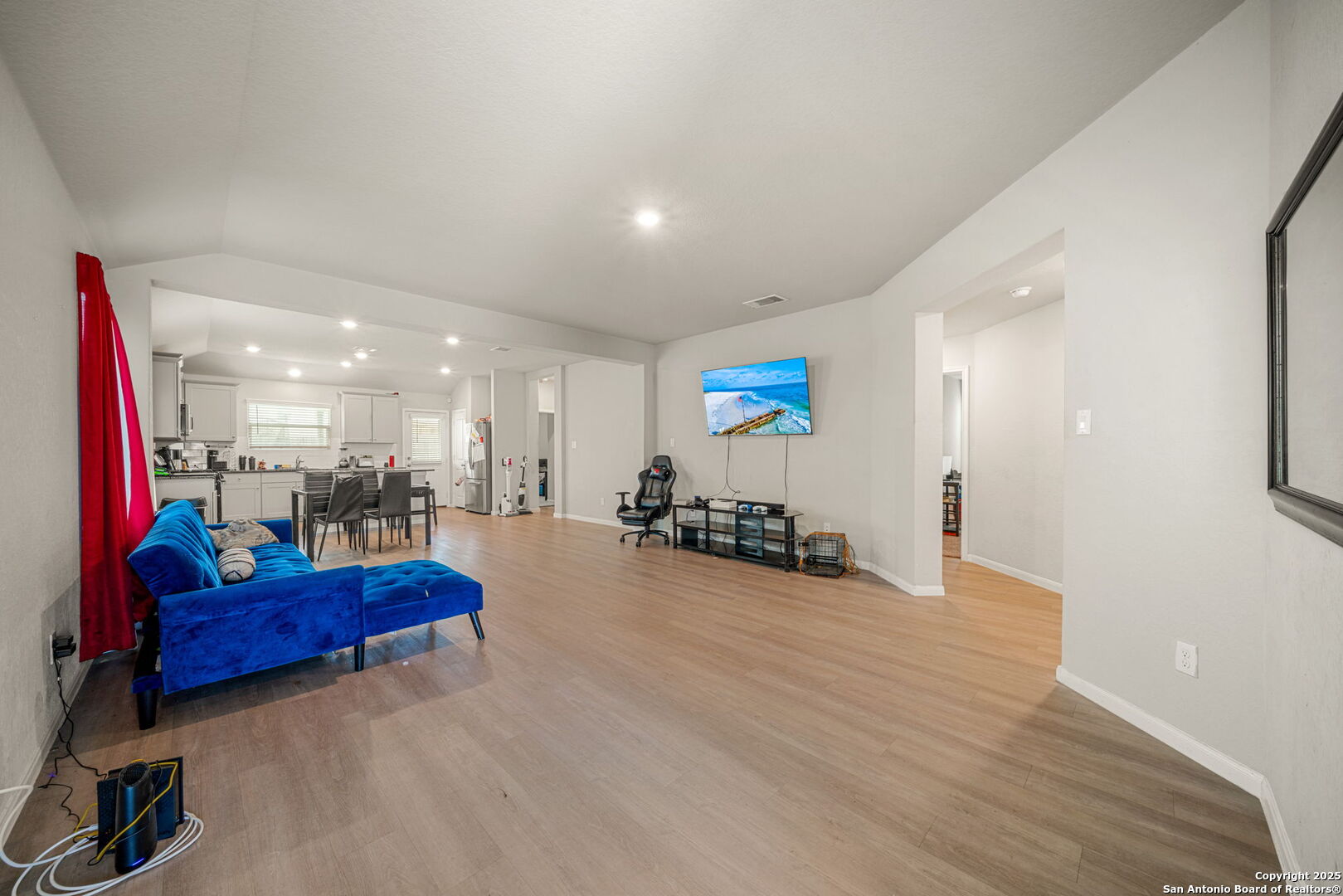 31646 Untrodden Way Bulverde, TX 78163 - Photo 6 of 36 a view of a living room with furniture and a flat screen tv