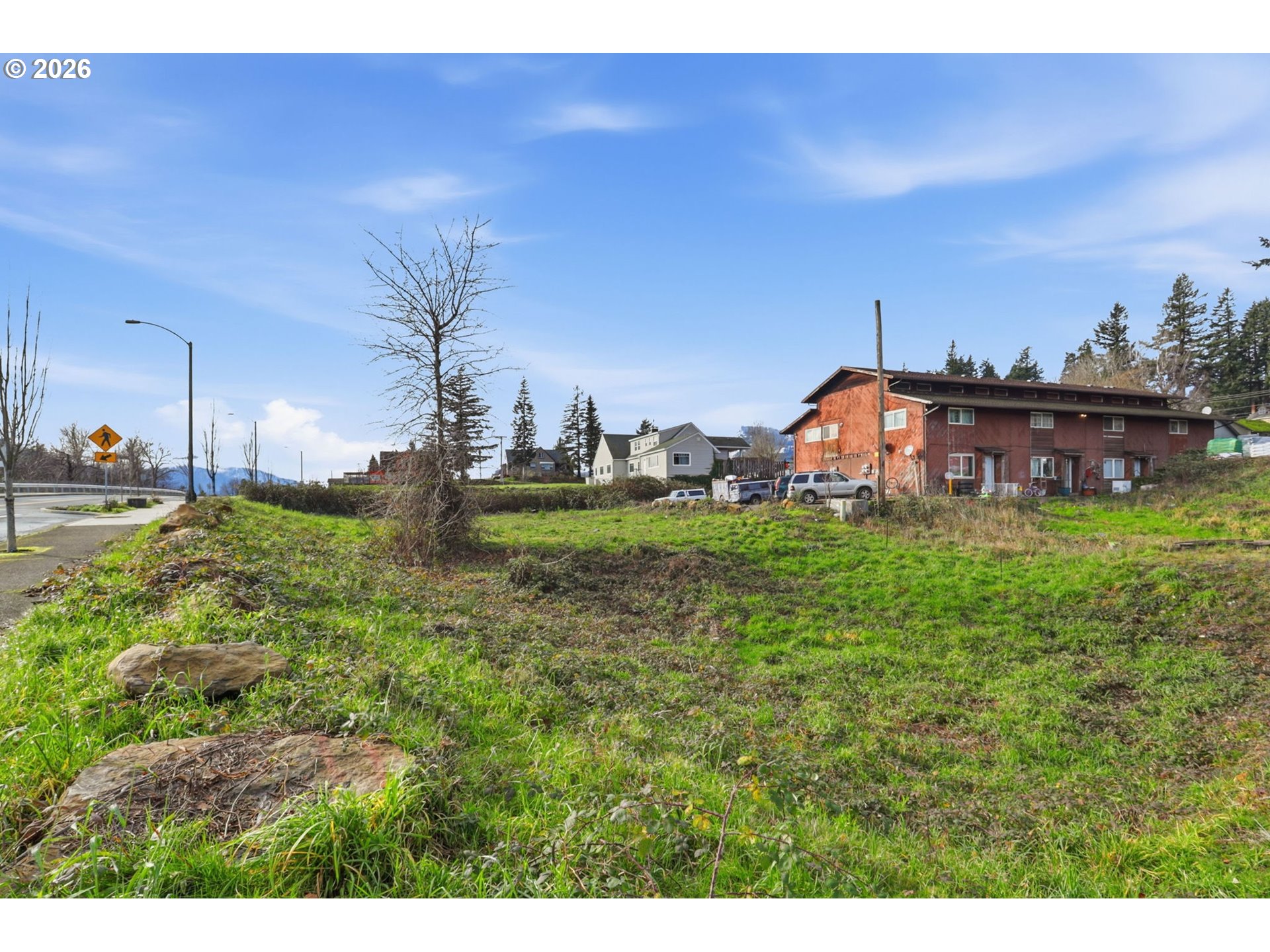 1st Street Stevenson, WA 98648 - Photo 15 of 18 a view of a house with a yard and sitting area