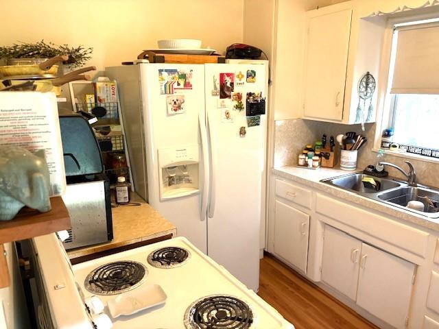 44 Southwest 5th Street Dania Beach, FL 33004 - Photo 19 of 43 a kitchen with a refrigerator and a stove