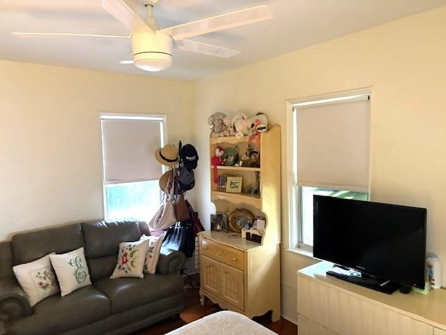 44 Southwest 5th Street Dania Beach, FL 33004 - Photo 22 of 43 a living room with furniture and a flat screen tv