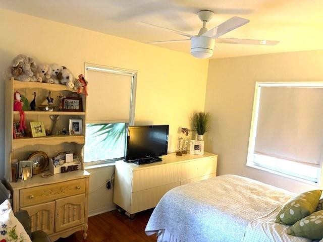 44 Southwest 5th Street Dania Beach, FL 33004 - Photo 23 of 43 a bedroom with a bed and a flat screen tv
