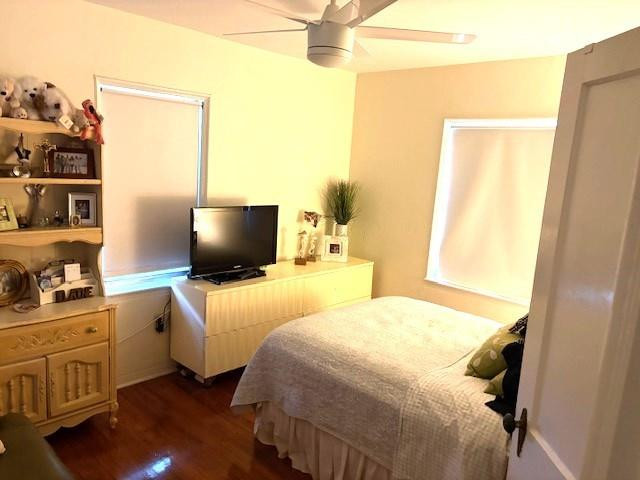 44 Southwest 5th Street Dania Beach, FL 33004 - Photo 27 of 43 a bedroom with a bed and flat screen tv