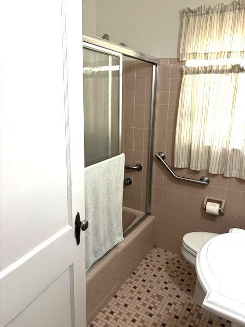 44 Southwest 5th Street Dania Beach, FL 33004 - Photo 29 of 43 a bathroom with a sink a toilet a window and shower