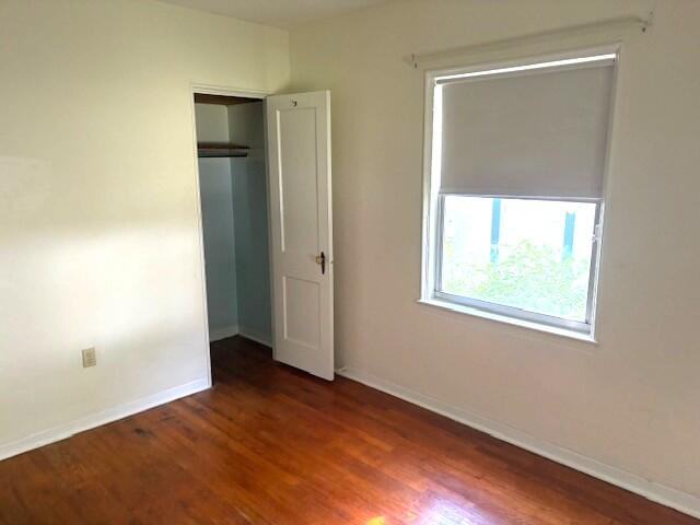 44 Southwest 5th Street Dania Beach, FL 33004 - Photo 35 of 43 an empty room with wooden floor and a window