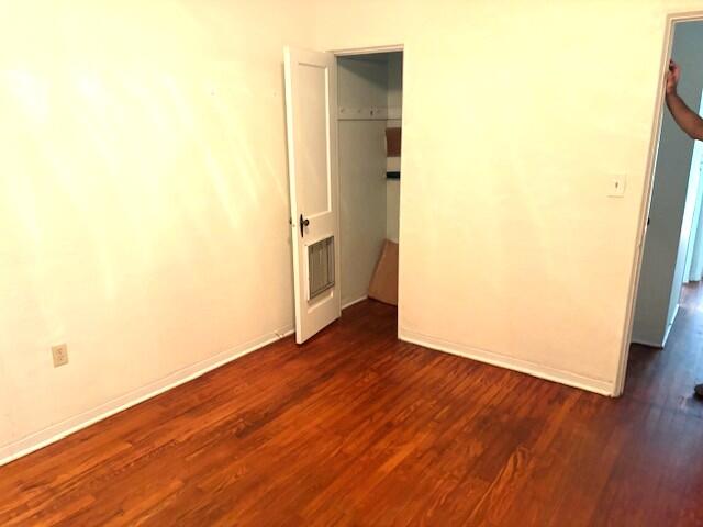 44 Southwest 5th Street Dania Beach, FL 33004 - Photo 41 of 43 a view of a hallway with wooden floor