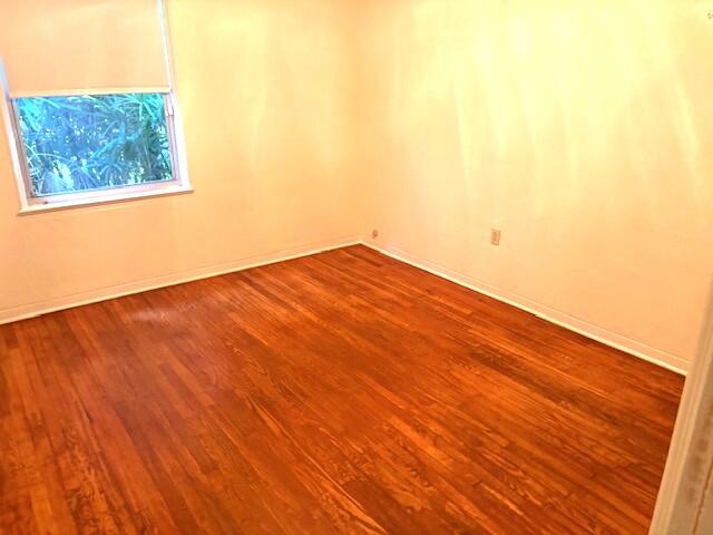 44 Southwest 5th Street Dania Beach, FL 33004 - Photo 42 of 43 a view of empty room with wooden floor and fan
