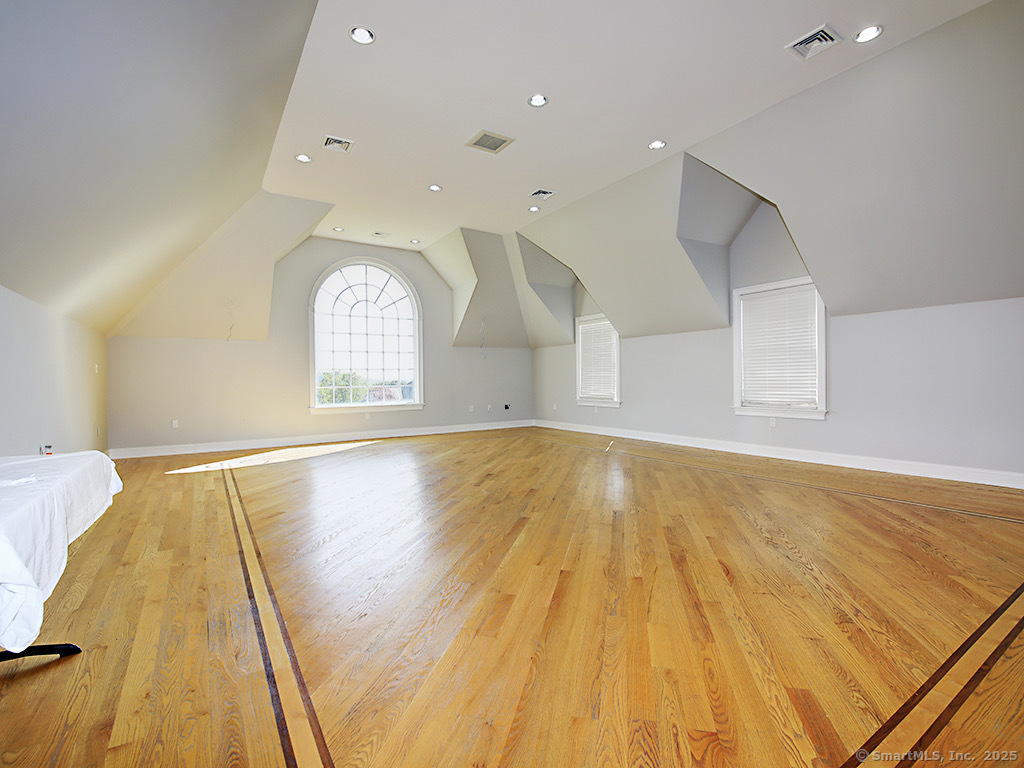 114 Wheeler Farm Road Watertown, CT 06795 - Photo 13 of 23 a view of a room with wooden floor and window