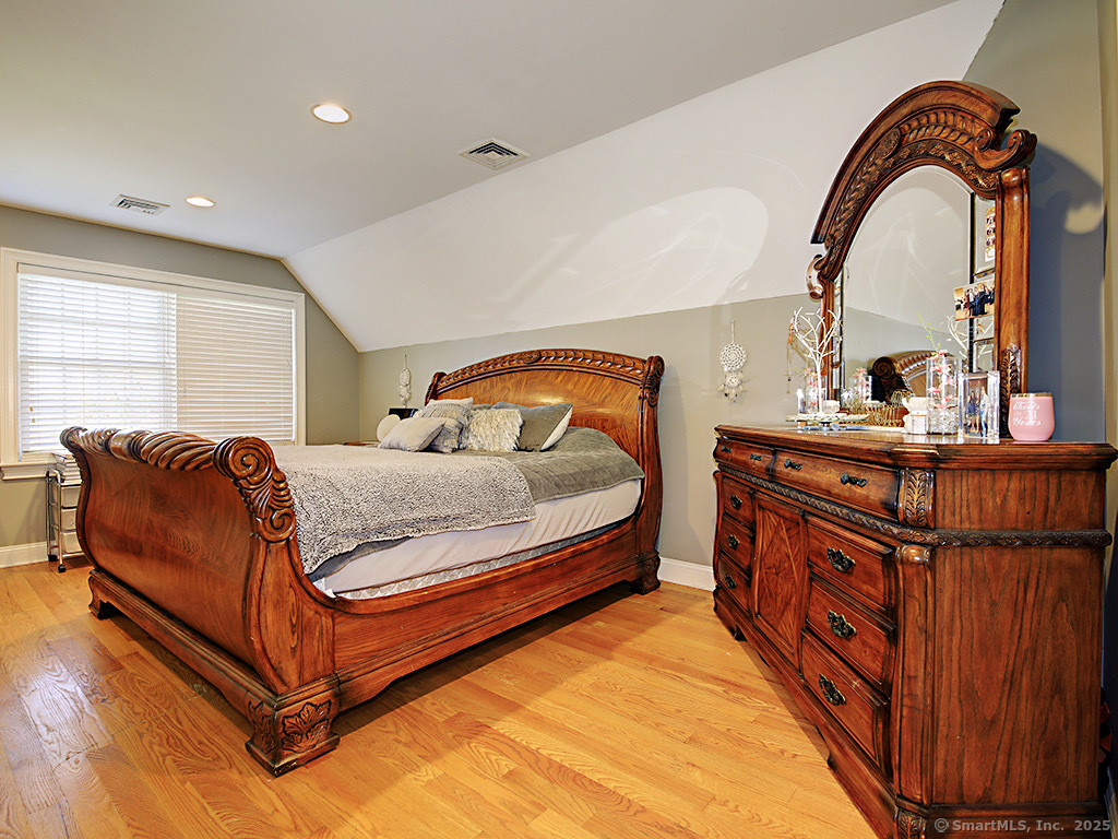 114 Wheeler Farm Road Watertown, CT 06795 - Photo 20 of 23 a bedroom with furniture and a window