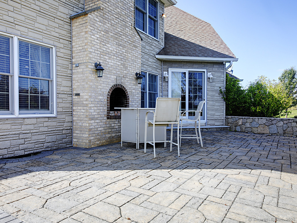 114 Wheeler Farm Road Watertown, CT 06795 - Photo 23 of 23 a outdoor space with a table and chairs