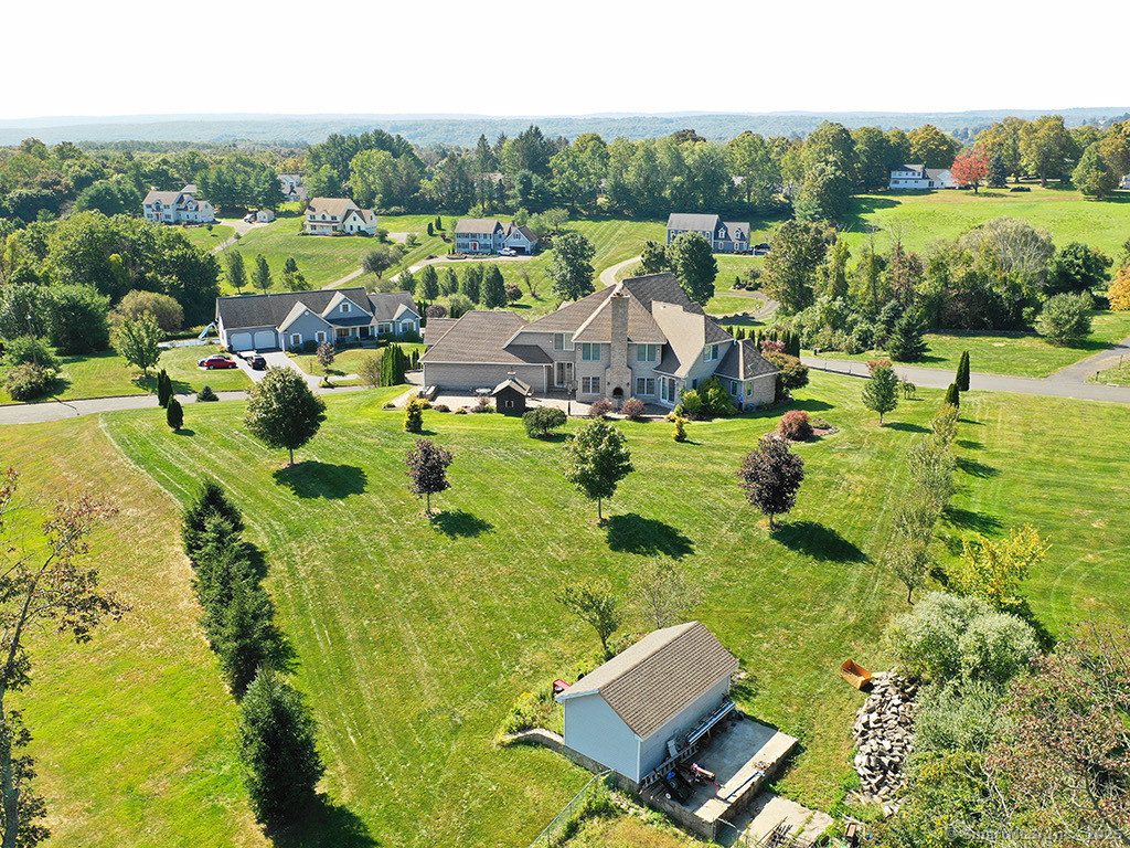 114 Wheeler Farm Road Watertown, CT 06795 - Photo 4 of 23 a view of a lake with a house
