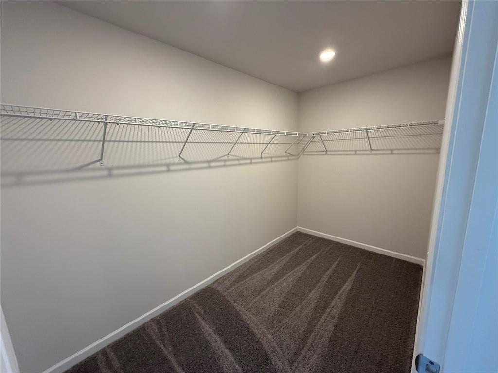 5143 Longview Run Decatur, GA 30035 - Photo 12 of 17 a view of a room with racks on the wall