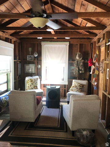 13581 13581st Huntsville, UT 84317 - Photo 3 of 11 Exposed wood beam ceiling with a ceiling fan