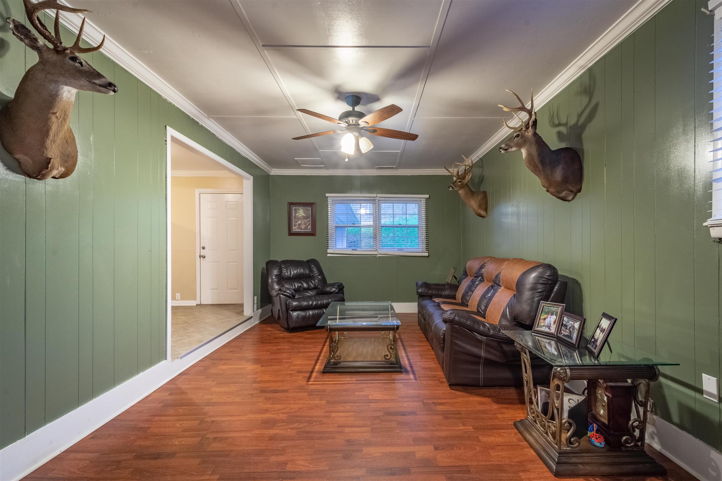 1666 Prospect Elkton Road Prospect, TN 38477 - Photo 27 of 30 a living room with furniture and a chandelier