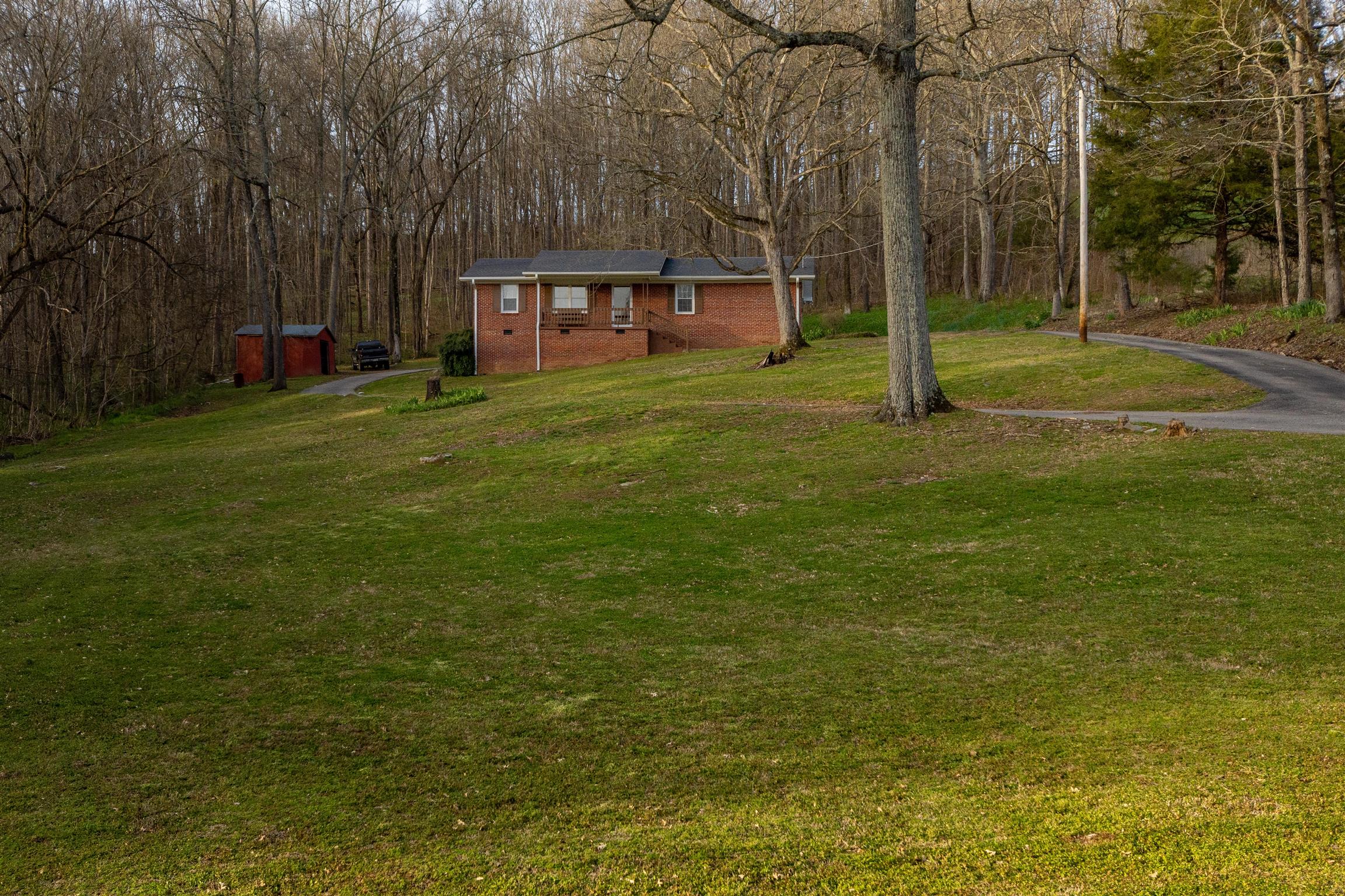 1666 Prospect Elkton Road Prospect, TN 38477 - Photo 5 of 30 a view of a house with a backyard