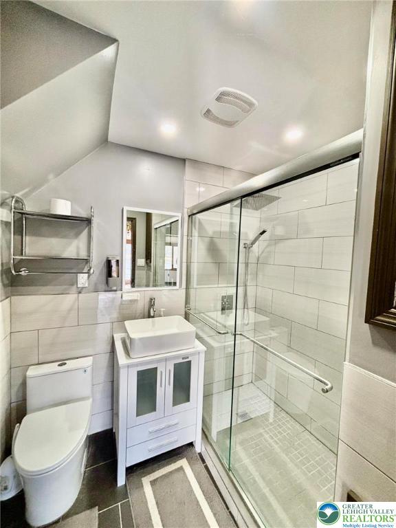 5449 Depues Road Bangor, PA 18013 - Photo 15 of 39 a bathroom with a toilet sink and shower