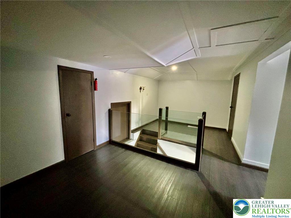 5449 Depues Road Bangor, PA 18013 - Photo 17 of 39 a bedroom with a bed and a mirror