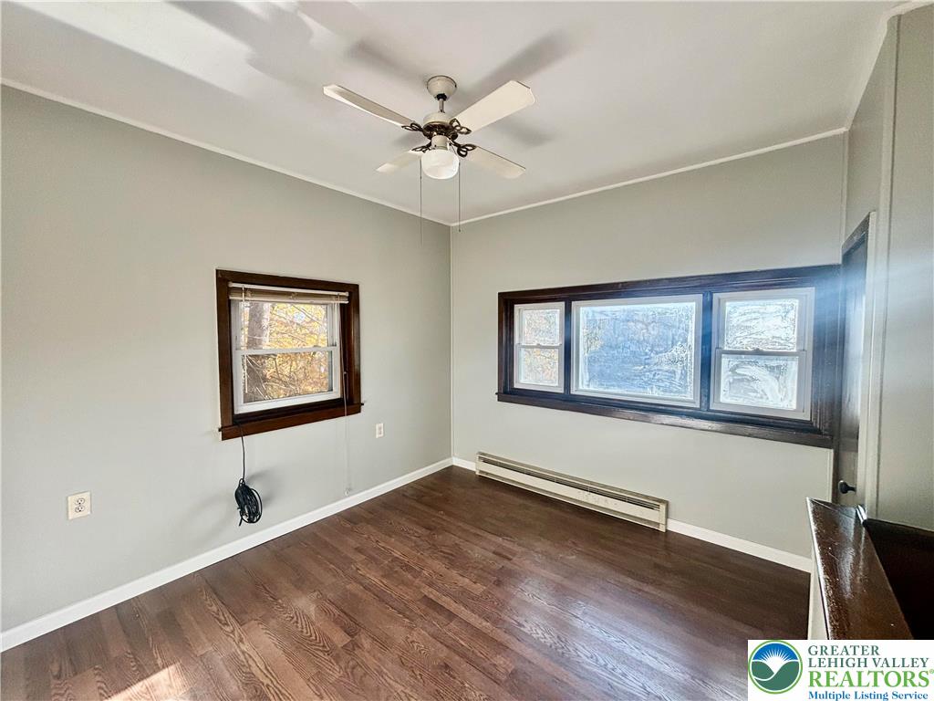 5449 Depues Road Bangor, PA 18013 - Photo 26 of 39 a view of an empty room with a window and wooden floor