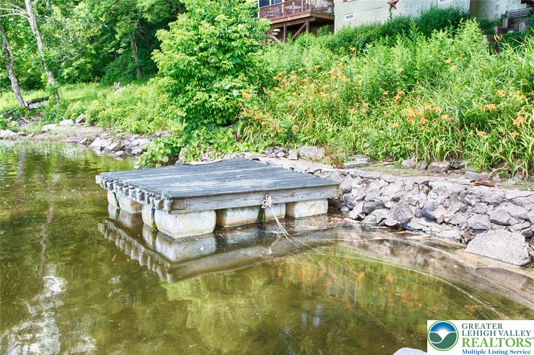 5449 Depues Road Bangor, PA 18013 - Photo 34 of 39 a small pool with some trees in the background