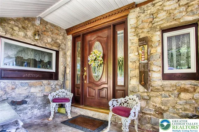 a view of a park with large trees