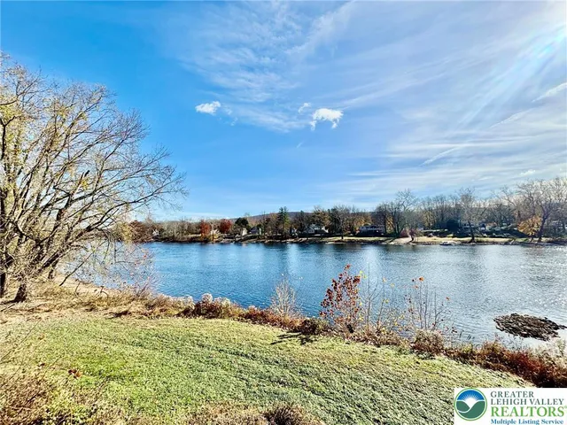 a view of a lake with houses