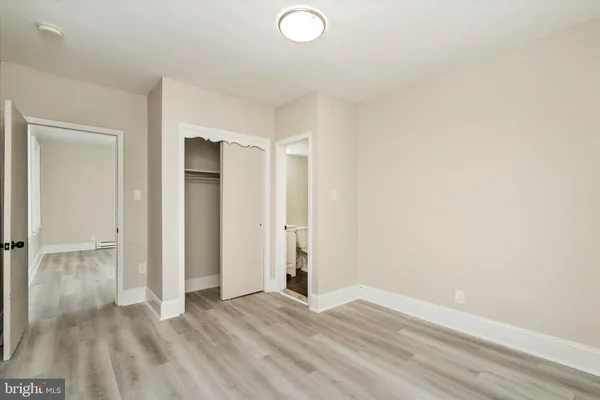 a kitchen with stainless steel appliances granite countertop a refrigerator sink and stove