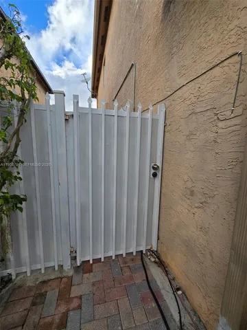 a view of a wooden fence