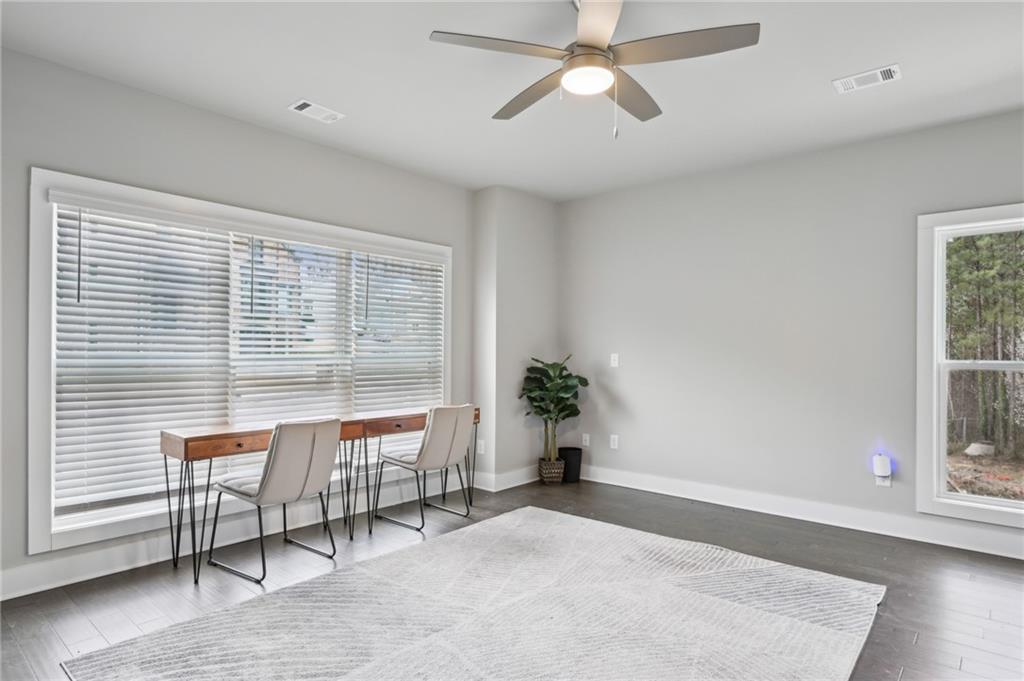 3143 Stonegate Drive Atlanta, GA 30331 - Photo 15 of 32 a living room with furniture and a window