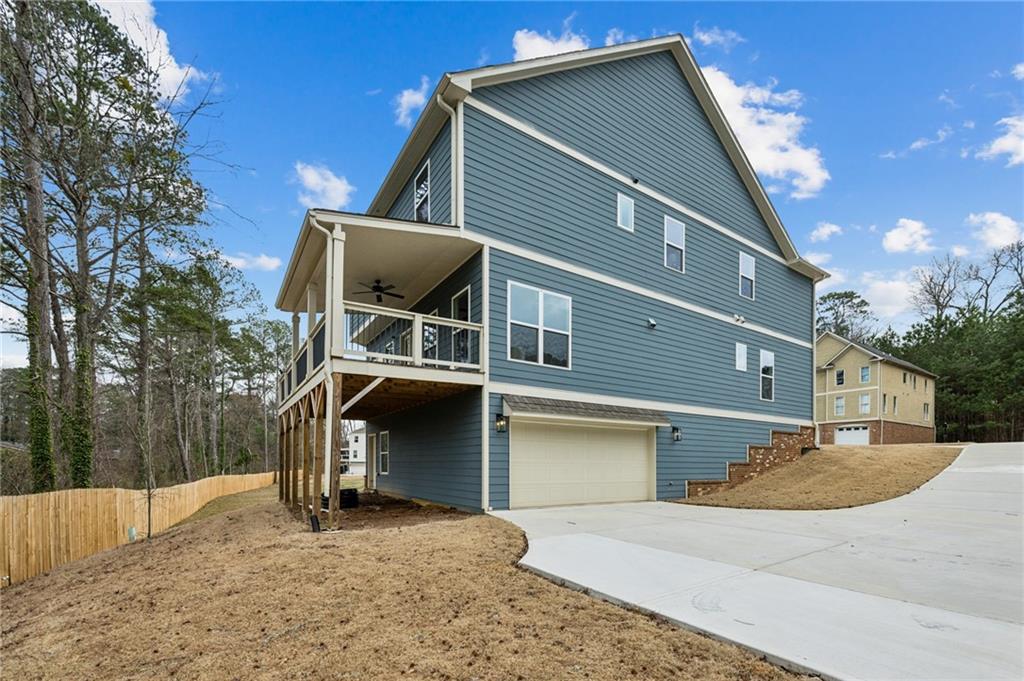 3143 Stonegate Drive Atlanta, GA 30331 - Photo 32 of 32 a front view of a house with a yard