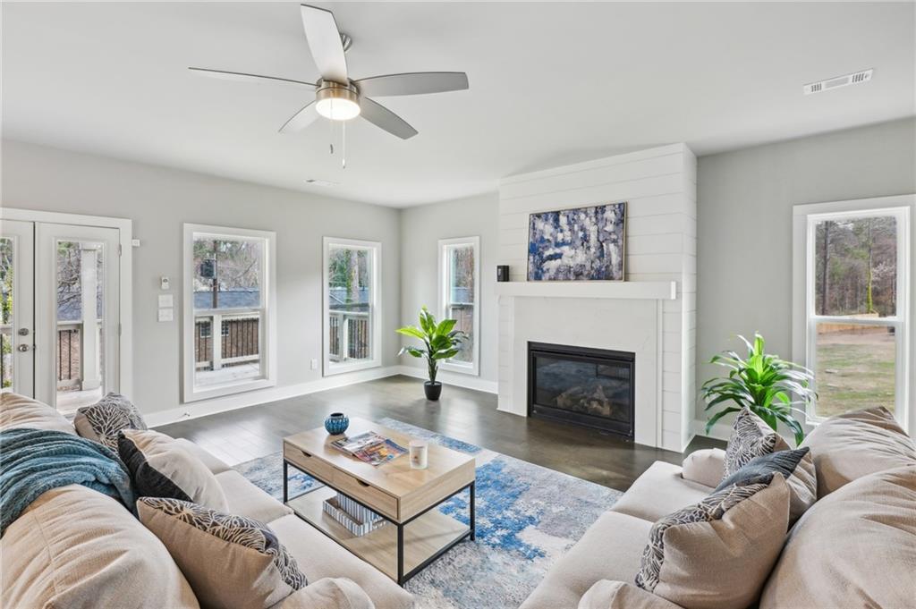 3143 Stonegate Drive Atlanta, GA 30331 - Photo 7 of 32 a living room with furniture and a fireplace