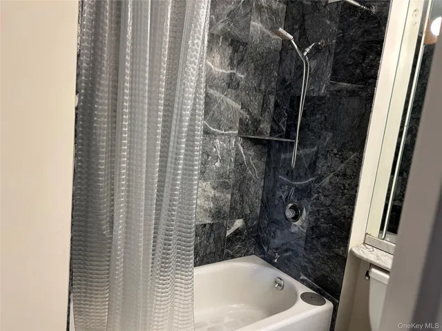 a bathroom with a bathtub