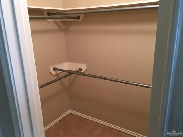 a view of balcony with wooden floor