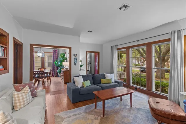 a living room with furniture and a gate