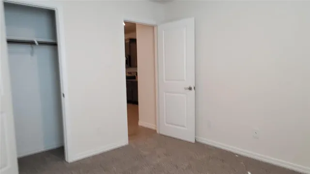 an empty room with closet