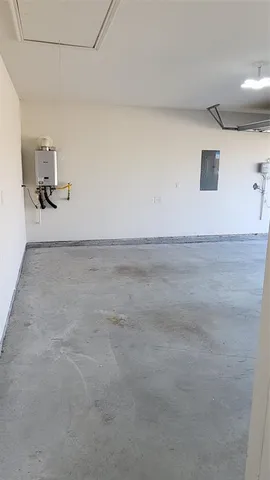 a view of a refrigerator in bathroom
