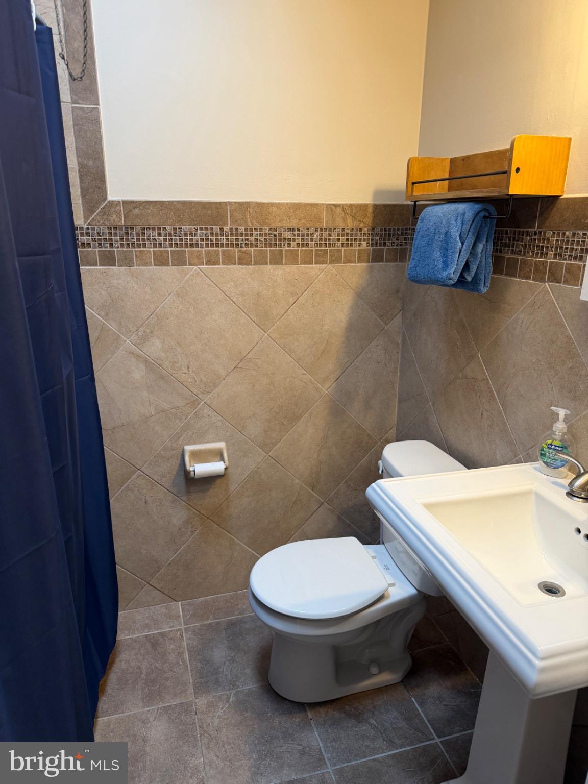 1034 Cedarwood Road Glenolden, PA 19036 - Photo 17 of 26 Modern bathroom with elegant tiles.