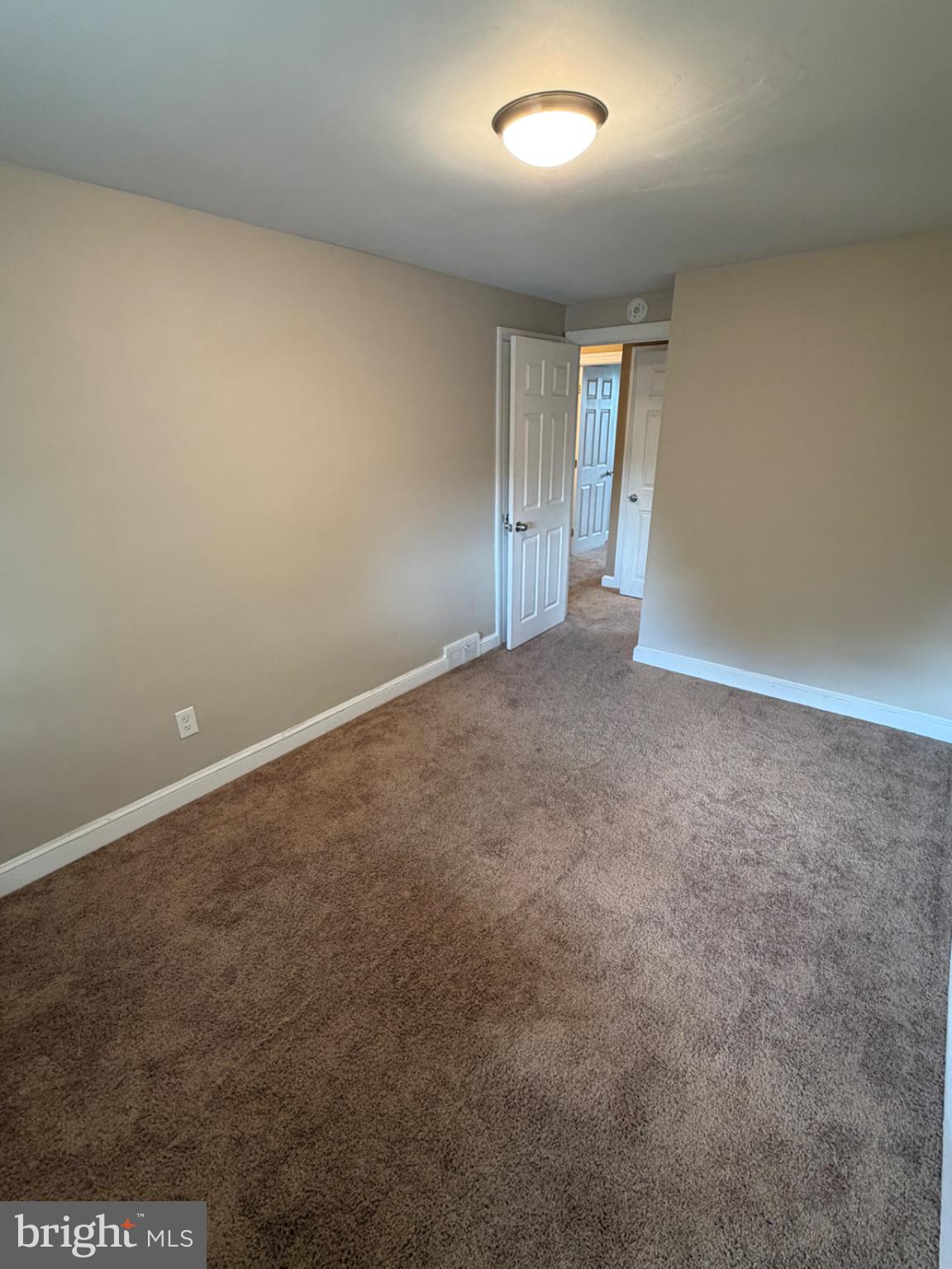 1034 Cedarwood Road Glenolden, PA 19036 - Photo 21 of 26 Spacious room with inviting warmth.