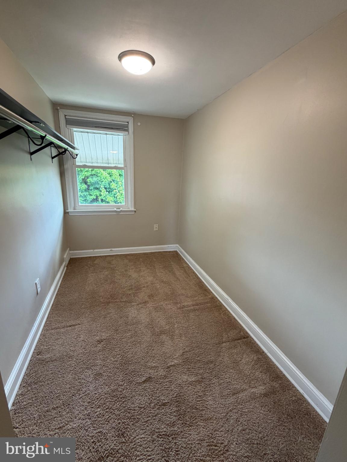 1034 Cedarwood Road Glenolden, PA 19036 - Photo 22 of 26 Cozy, sunlit room with soft carpet.