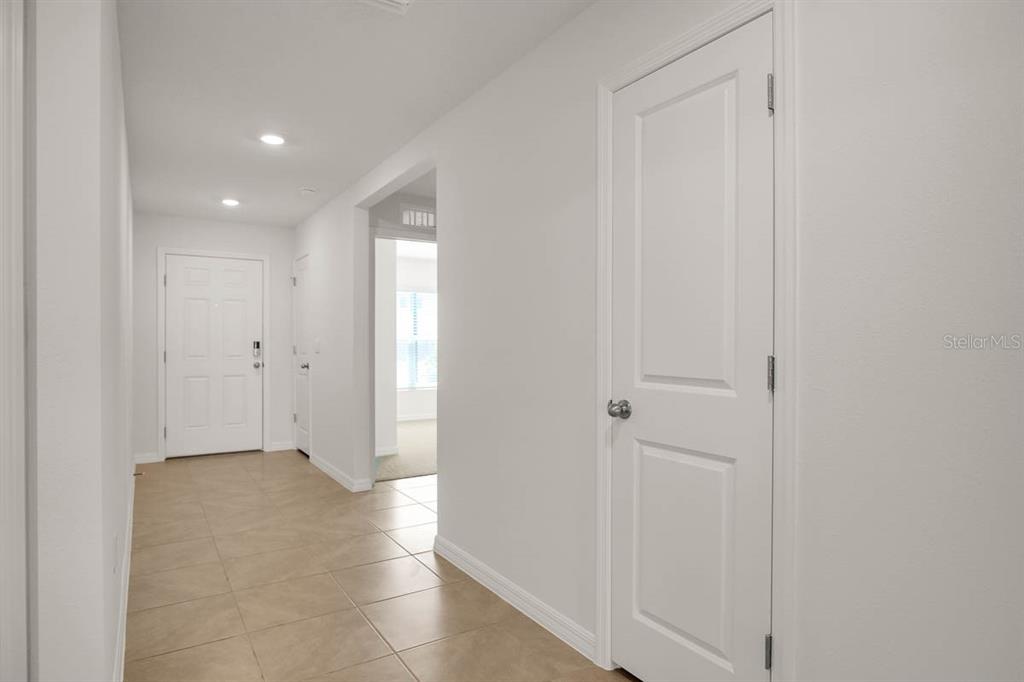 16530 Windmill Forge Pass Wimauma, FL 33598 - Photo 4 of 33 a view of an empty room