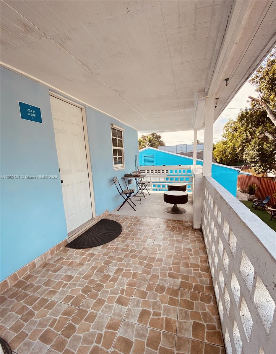 227 Northwest 34th Street, Unit 3 Miami, FL 33127 - Photo 2 of 6 a living room with furniture