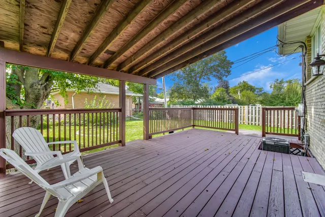 a view of balcony with wooden floor and outdoor space