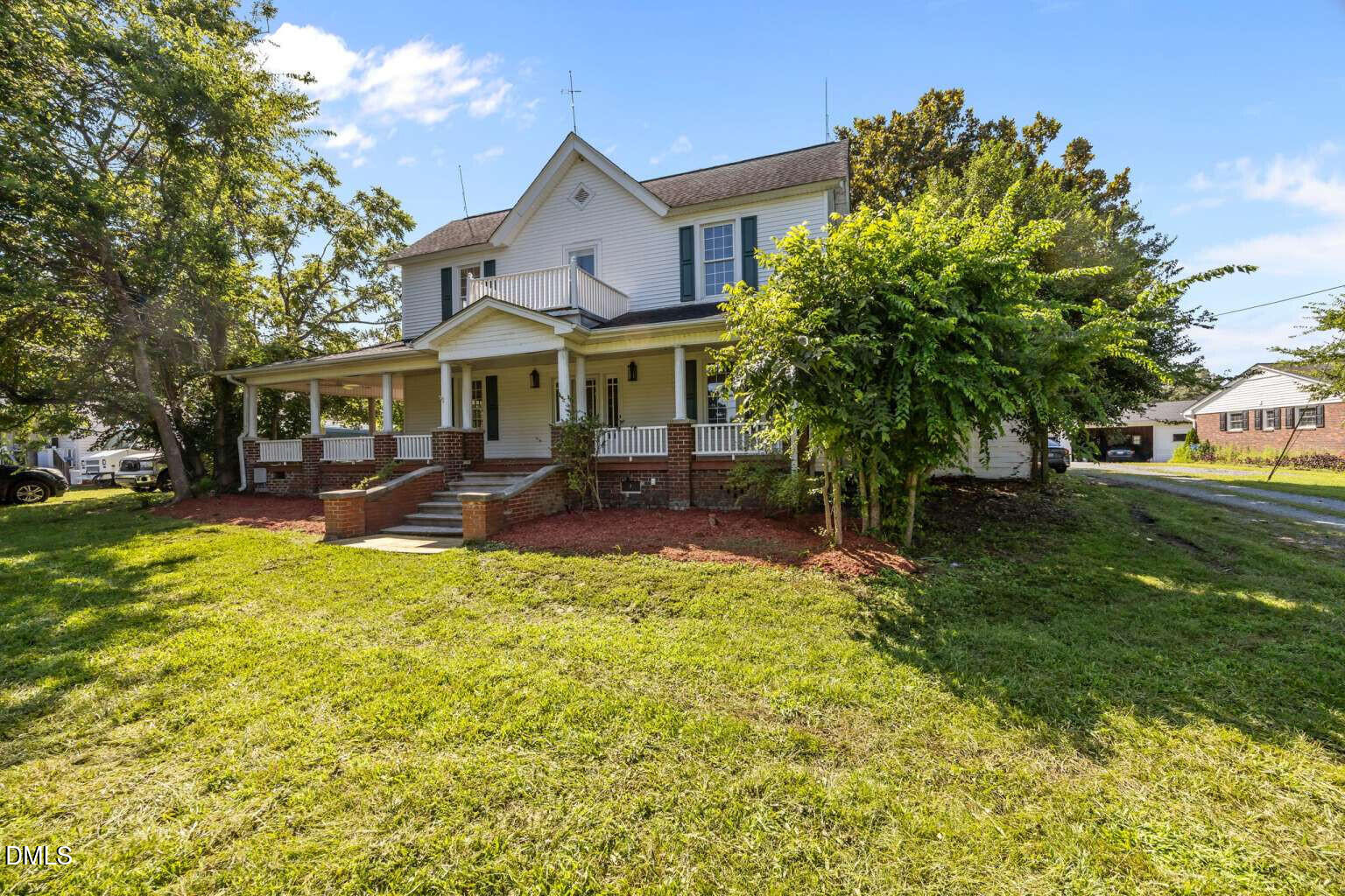 523 East Main Street Haw River, NC 27258 - Photo 1 of 25 a front view of a house with garden