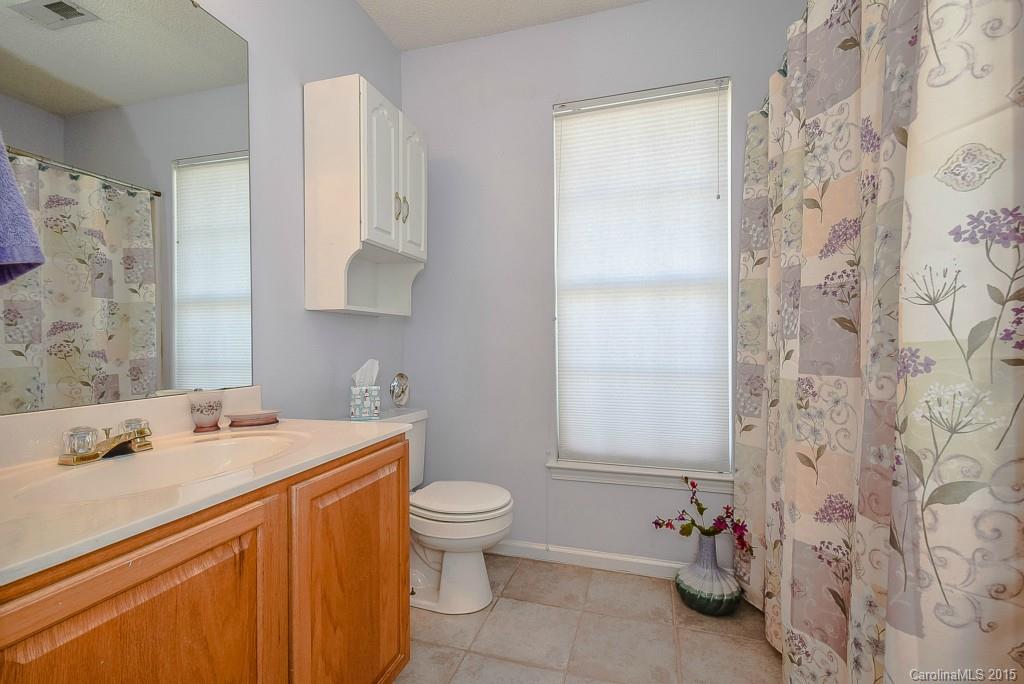 4004 Lake Park Road Indian Trail, NC 28079 - Photo 15 of 19 a bathroom with a sink toilet and shower