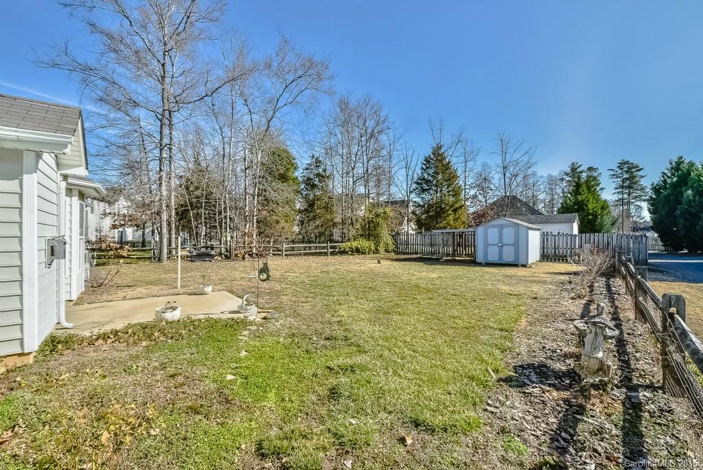 4004 Lake Park Road Indian Trail, NC 28079 - Photo 17 of 19 a swimming pool with wooden fence