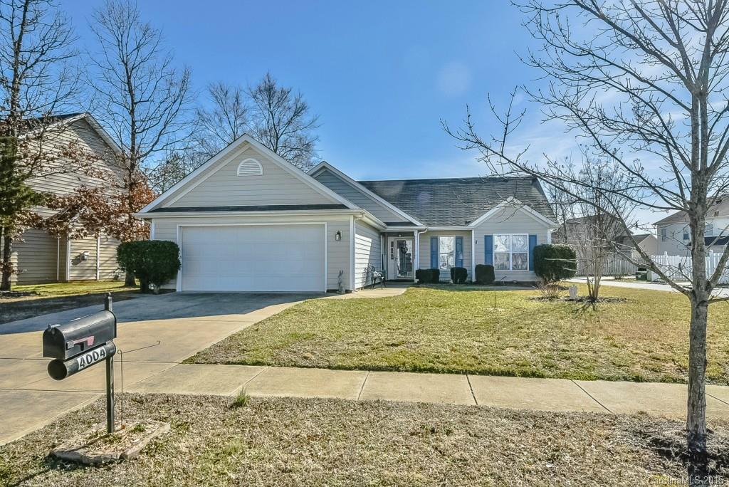 4004 Lake Park Road Indian Trail, NC 28079 - Photo 19 of 19 a front view of a house with garden