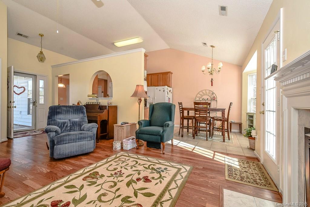 4004 Lake Park Road Indian Trail, NC 28079 - Photo 4 of 19 a living room with furniture and a rug