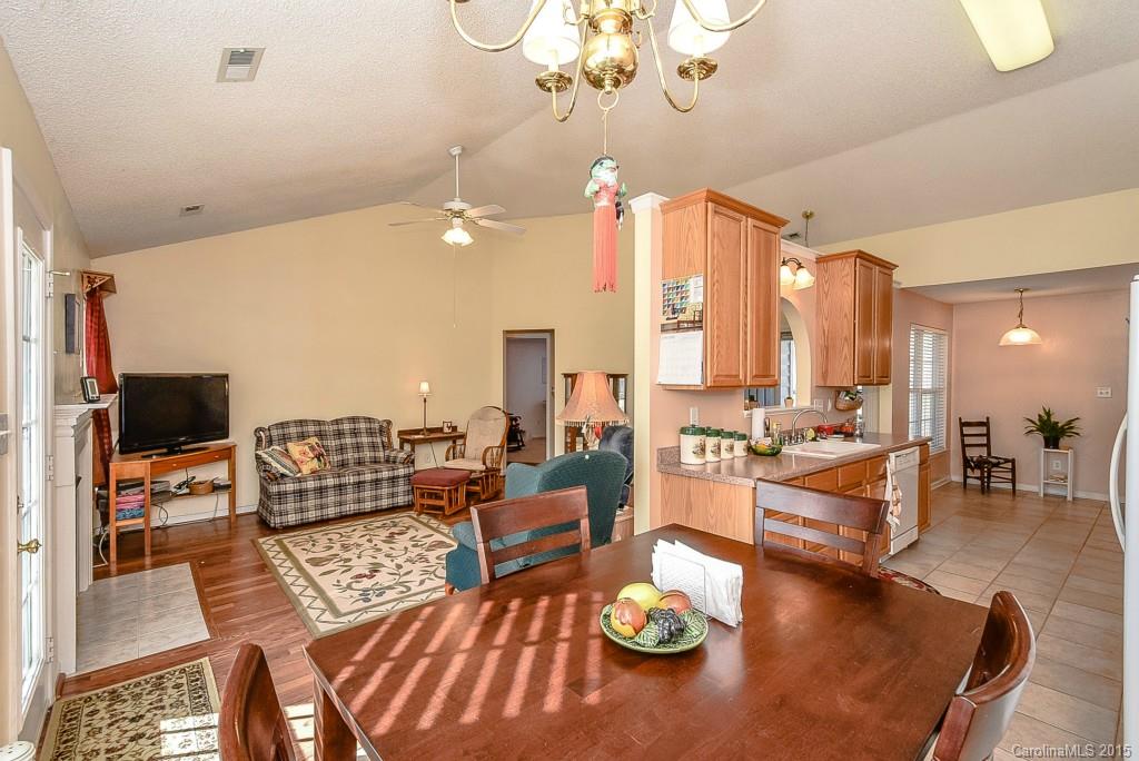 4004 Lake Park Road Indian Trail, NC 28079 - Photo 6 of 19 a living room with furniture kitchen view and a large window