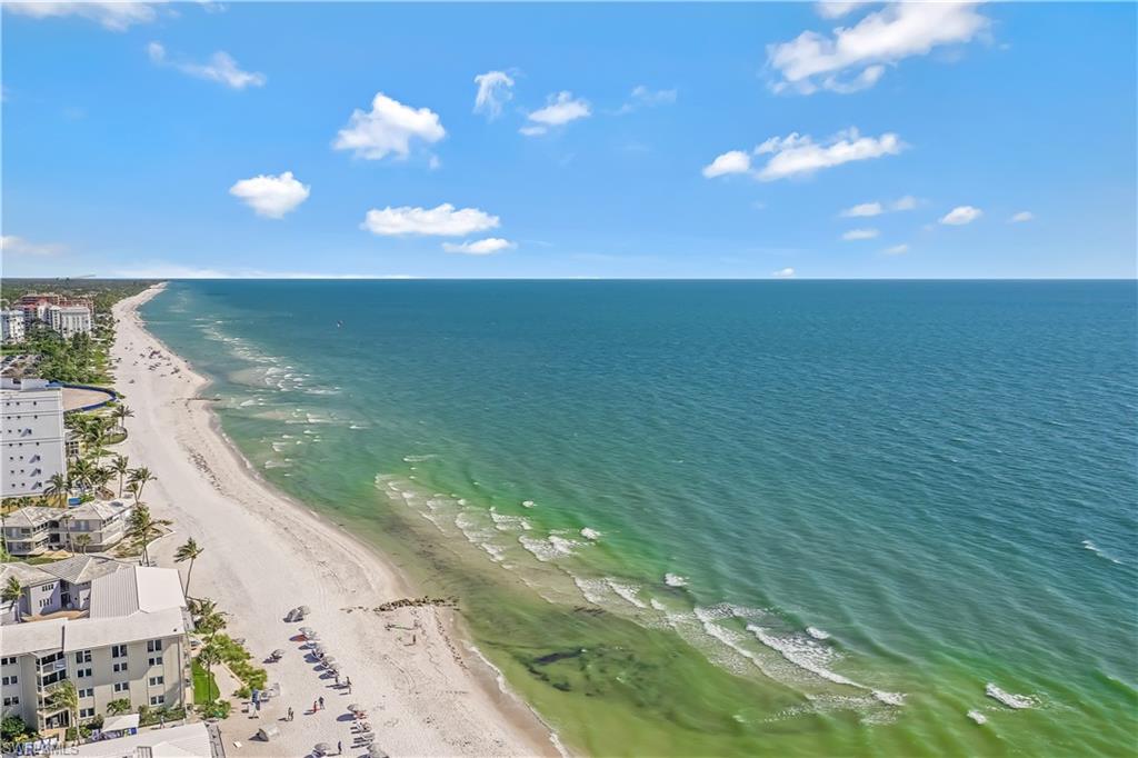 350 Rudder Road Naples, FL 34102 - Photo 14 of 14 a view of an ocean from a balcony