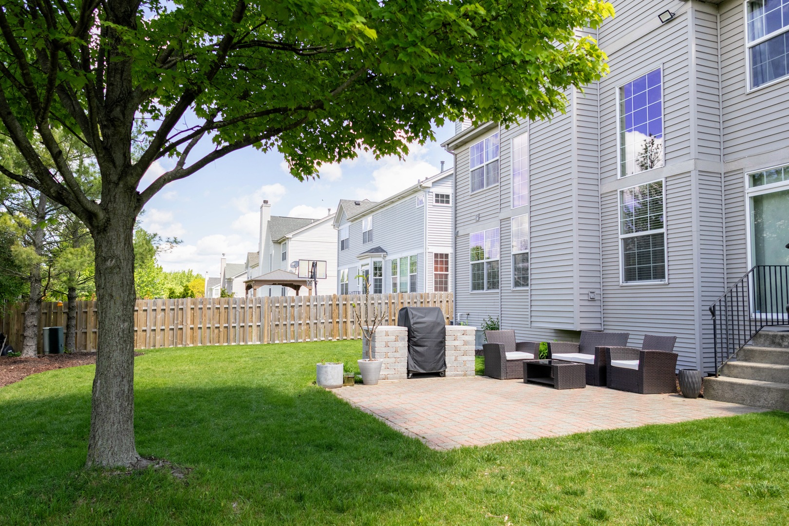 421 Post Oak Circle West Chicago, IL 60185 - Photo 22 of 22 a front view of a house with a yard