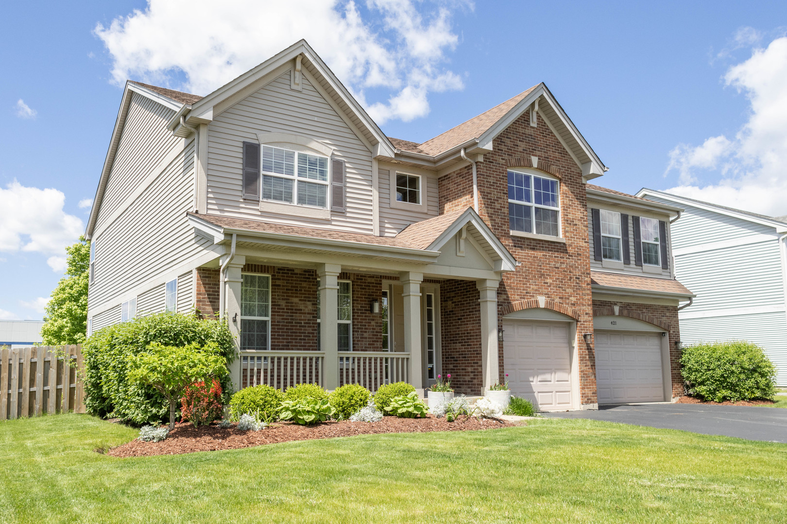 421 Post Oak Circle West Chicago, IL 60185 - Photo 3 of 22 front view of a house with a yard
